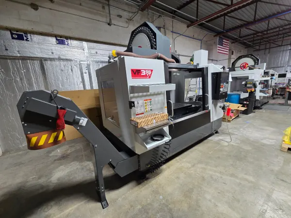 Haas VF-3SSYT CNC vertical milling machine on shop floor at Olympus Machining facility in Hanover, Pennsylvania