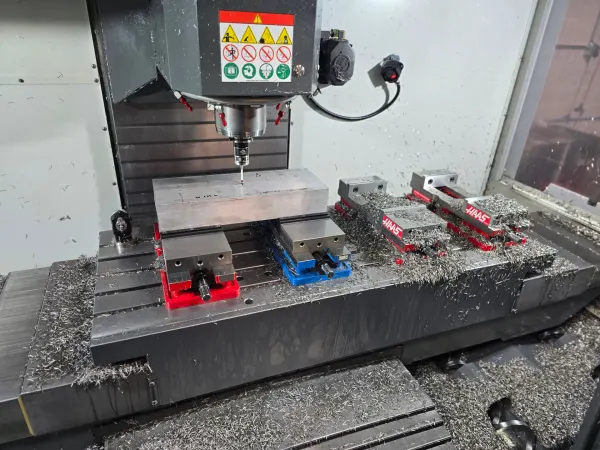 5-axis CNC milling of aluminum aerospace bracket with precision fixturing at Olympus Machining, Hanover, Pennsylvania